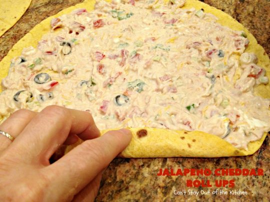 Jalapeno Cheddar Roll Ups | Can't Stay Out of the Kitchen | these fantastic #TexMex #appetizers are terrific for #tailgating, #NewYearsEve or #SuperBowl parties. Filled with #refriedbeans, #chilies, #olives, & lots of #cheese.