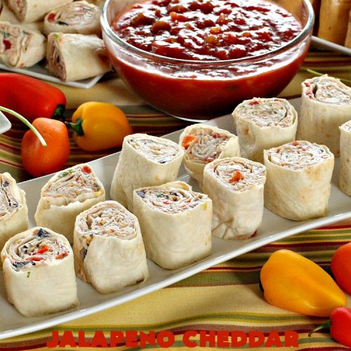 Jalapeno Cheddar Roll Ups | Can't Stay Out of the Kitchen | these fantastic #TexMex #appetizers are terrific for #tailgating, #NewYearsEve or #SuperBowl parties. Filled with #refriedbeans, #chilies, #olives, & lots of #cheese.