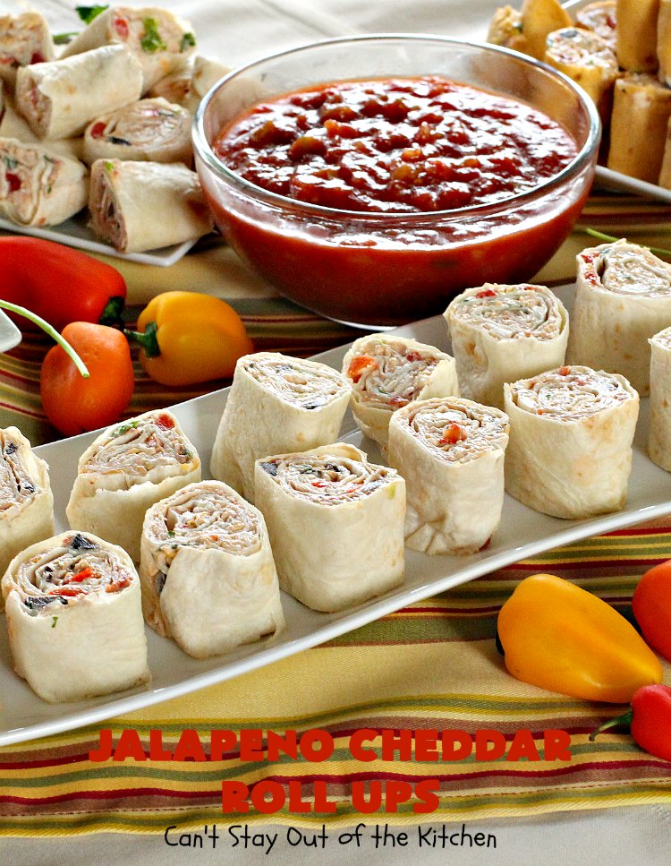 Jalapeno Cheddar Roll Ups | Can't Stay Out of the Kitchen | these fantastic #TexMex #appetizers are terrific for #tailgating, #NewYearsEve or #SuperBowl parties. Filled with #refriedbeans, #chilies, #olives, & lots of #cheese.