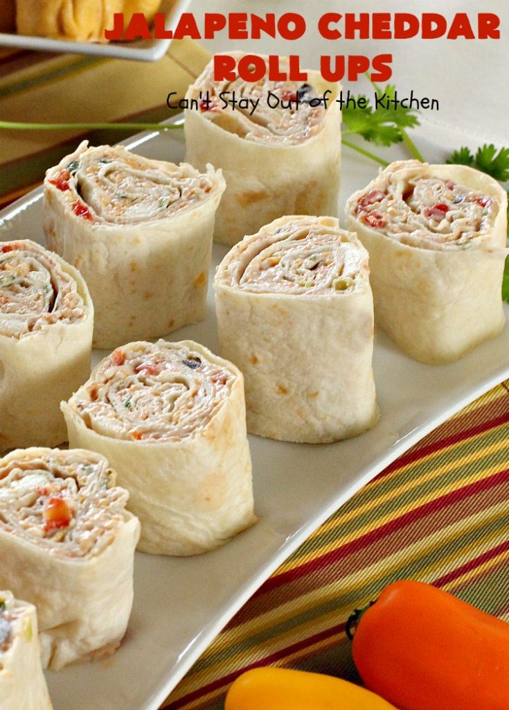Jalapeno Cheddar Roll Ups | Can't Stay Out of the Kitchen | these fantastic #TexMex #appetizers are terrific for #tailgating, #NewYearsEve or #SuperBowl parties. Filled with #refriedbeans, #chilies, #olives, & lots of #cheese.