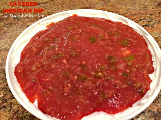 Layered Mexican Dip | Can't Stay Out of the Kitchen | this super easy 5-ingredient #appetizer can be made in a jiffy! It's perfect for #tailgating parties, potlucks, grilling out or anytime you're getting together with company. Everyone always loves it! #salsa #TexMex #cheddarcheese #EasyAppetizer #EasyTexMexAppetizer #LayeredMexicanDip