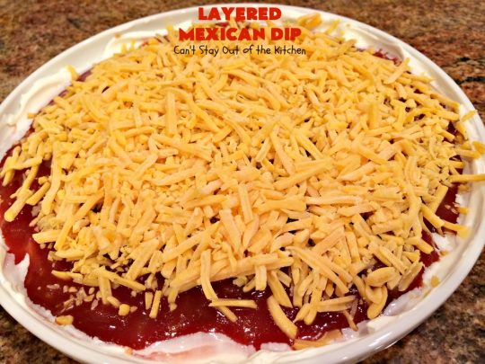 Layered Mexican Dip | Can't Stay Out of the Kitchen | this super easy 5-ingredient #appetizer can be made in a jiffy! It's perfect for #tailgating parties, potlucks, grilling out or anytime you're getting together with company. Everyone always loves it! #salsa #TexMex #cheddarcheese #EasyAppetizer #EasyTexMexAppetizer #LayeredMexicanDip