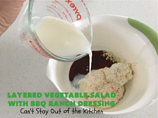 Layered Vegetable Salad with BBQ Ranch Dressing is spectacular! This amazing #salad uses all kinds of fresh #veggies, plus #bacon & two kinds of #cheese: #Cheddar & #MontereyJack. The #BBQRanchDressing is what gives the #recipe such amazing flavor. This #LayeredSalad is terrific for company or #holiday dinners & is #GlutenFree. #eggs #LayeredVegetableSaladWith BBQRanchDressing