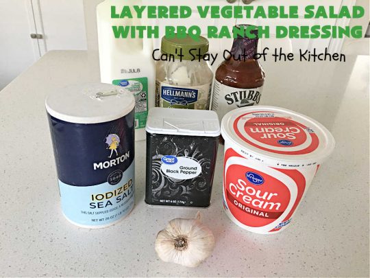 Layered Vegetable Salad with BBQ Ranch Dressing is spectacular! This amazing #salad uses all kinds of fresh #veggies, plus #bacon & two kinds of #cheese: #Cheddar & #MontereyJack. The #BBQRanchDressing is what gives the #recipe such amazing flavor. This #LayeredSalad is terrific for company or #holiday dinners & is #GlutenFree. #eggs #LayeredVegetableSaladWith BBQRanchDressing