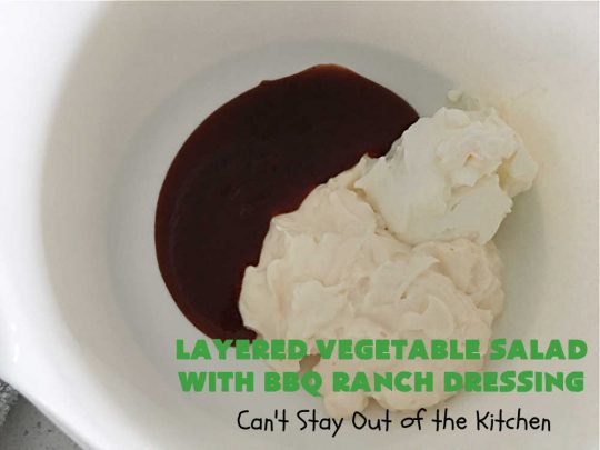 Layered Vegetable Salad with BBQ Ranch Dressing is spectacular! This amazing #salad uses all kinds of fresh #veggies, plus #bacon & two kinds of #cheese: #Cheddar & #MontereyJack. The #BBQRanchDressing is what gives the #recipe such amazing flavor. This #LayeredSalad is terrific for company or #holiday dinners & is #GlutenFree. #eggs #LayeredVegetableSaladWith BBQRanchDressing