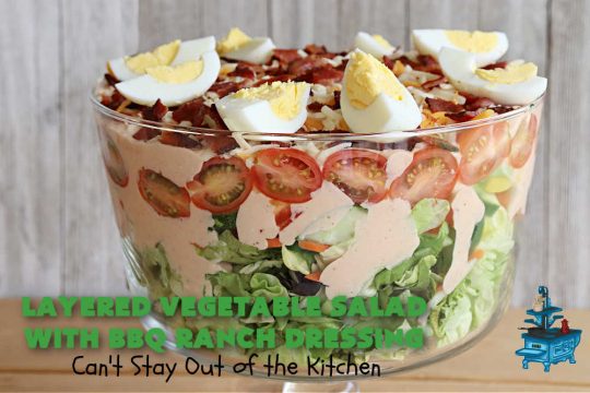 Layered Vegetable Salad with BBQ Ranch Dressing is spectacular! This amazing #salad uses all kinds of fresh #veggies, plus #bacon & two kinds of #cheese: #Cheddar & #MontereyJack. The #BBQRanchDressing is what gives the #recipe such amazing flavor. This #LayeredSalad is terrific for company or #holiday dinners & is #GlutenFree. #eggs #LayeredVegetableSaladWith BBQRanchDressing