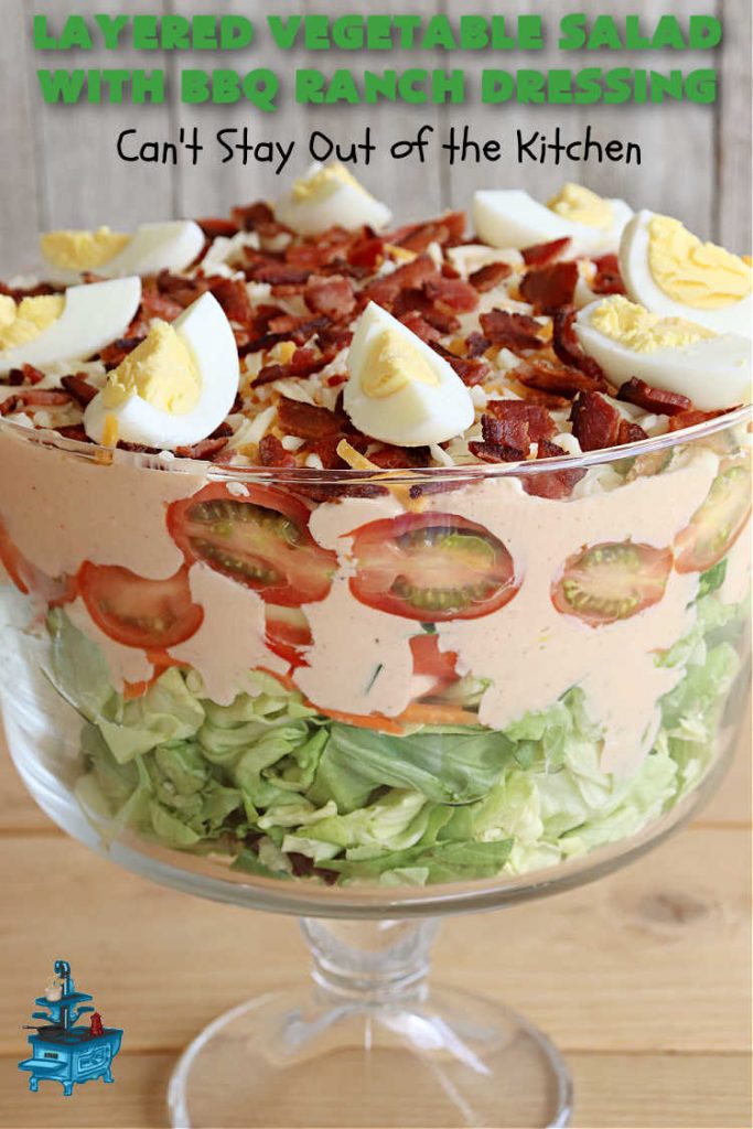 Layered Vegetable Salad with BBQ Ranch Dressing is spectacular! This amazing #salad uses all kinds of fresh #veggies, plus #bacon & two kinds of #cheese: #Cheddar & #MontereyJack. The #BBQRanchDressing is what gives the #recipe such amazing flavor. This #LayeredSalad is terrific for company or #holiday dinners & is #GlutenFree. #eggs #LayeredVegetableSaladWith BBQRanchDressing