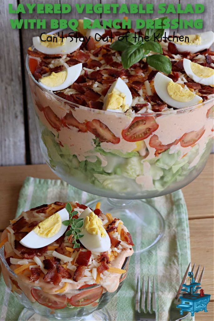 Layered Vegetable Salad with BBQ Ranch Dressing is spectacular! This amazing #salad uses all kinds of fresh #veggies, plus #bacon & two kinds of #cheese: #Cheddar & #MontereyJack. The #BBQRanchDressing is what gives the #recipe such amazing flavor. This #LayeredSalad is terrific for company or #holiday dinners & is #GlutenFree. #eggs #LayeredVegetableSaladWith BBQRanchDressing