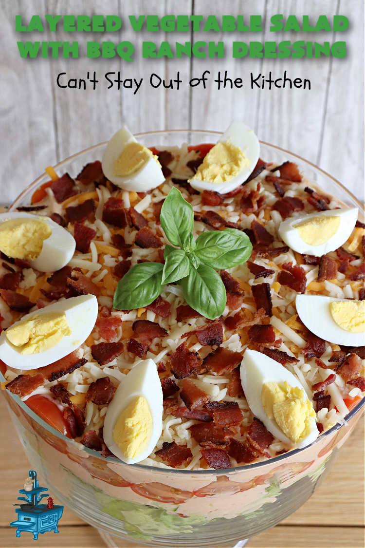 Layered Vegetable Salad with BBQ Ranch Dressing is spectacular! This amazing #salad uses all kinds of fresh #veggies, plus #bacon & two kinds of #cheese: #Cheddar & #MontereyJack. The #BBQRanchDressing is what gives the #recipe such amazing flavor. This #LayeredSalad is terrific for company or #holiday dinners & is #GlutenFree. #eggs #LayeredVegetableSaladWith BBQRanchDressing
