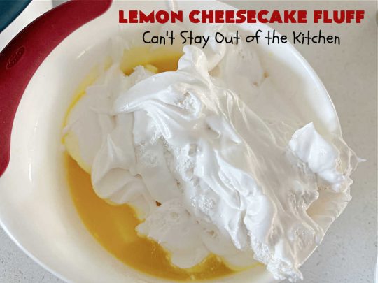 Lemon Cheesecake Fluff | Can't Stay Out of the Kitchen | this spectacular "fluff"-type #FruitSalad is terrific for company or #holiday dinners. It includes #CreamCheese, #CheesecakePuddingMix, #Lemon #JellO, miniature #marshmallows, #CoolWhip & #walnuts.Serve it in a trifle dish, glass bowl or parfait glasses for special occasions. #LemonCheesecakeFluff #salad