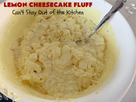 Lemon Cheesecake Fluff | Can't Stay Out of the Kitchen | this spectacular "fluff"-type #FruitSalad is terrific for company or #holiday dinners. It includes #CreamCheese, #CheesecakePuddingMix, #Lemon #JellO, miniature #marshmallows, #CoolWhip & #walnuts.Serve it in a trifle dish, glass bowl or parfait glasses for special occasions. #LemonCheesecakeFluff #salad