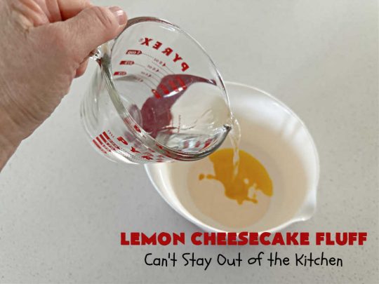 Lemon Cheesecake Fluff | Can't Stay Out of the Kitchen | this spectacular "fluff"-type #FruitSalad is terrific for company or #holiday dinners. It includes #CreamCheese, #CheesecakePuddingMix, #Lemon #JellO, miniature #marshmallows, #CoolWhip & #walnuts.Serve it in a trifle dish, glass bowl or parfait glasses for special occasions. #LemonCheesecakeFluff #salad