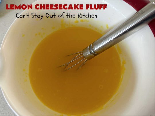 Lemon Cheesecake Fluff | Can't Stay Out of the Kitchen | this spectacular "fluff"-type #FruitSalad is terrific for company or #holiday dinners. It includes #CreamCheese, #CheesecakePuddingMix, #Lemon #JellO, miniature #marshmallows, #CoolWhip & #walnuts.Serve it in a trifle dish, glass bowl or parfait glasses for special occasions. #LemonCheesecakeFluff #salad