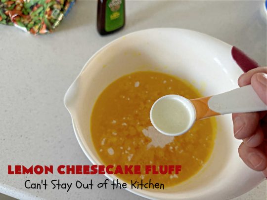 Lemon Cheesecake Fluff | Can't Stay Out of the Kitchen | this spectacular "fluff"-type #FruitSalad is terrific for company or #holiday dinners. It includes #CreamCheese, #CheesecakePuddingMix, #Lemon #JellO, miniature #marshmallows, #CoolWhip & #walnuts.Serve it in a trifle dish, glass bowl or parfait glasses for special occasions. #LemonCheesecakeFluff #salad