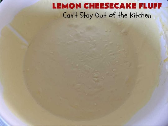 Lemon Cheesecake Fluff | Can't Stay Out of the Kitchen | this spectacular "fluff"-type #FruitSalad is terrific for company or #holiday dinners. It includes #CreamCheese, #CheesecakePuddingMix, #Lemon #JellO, miniature #marshmallows, #CoolWhip & #walnuts.Serve it in a trifle dish, glass bowl or parfait glasses for special occasions. #LemonCheesecakeFluff #salad