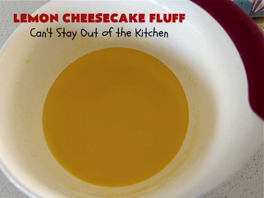 Lemon Cheesecake Fluff | Can't Stay Out of the Kitchen | this spectacular "fluff"-type #FruitSalad is terrific for company or #holiday dinners. It includes #CreamCheese, #CheesecakePuddingMix, #Lemon #JellO, miniature #marshmallows, #CoolWhip & #walnuts.Serve it in a trifle dish, glass bowl or parfait glasses for special occasions. #LemonCheesecakeFluff #salad