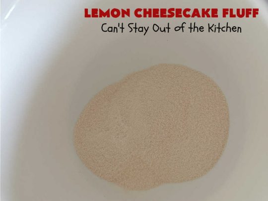Lemon Cheesecake Fluff | Can't Stay Out of the Kitchen | this spectacular "fluff"-type #FruitSalad is terrific for company or #holiday dinners. It includes #CreamCheese, #CheesecakePuddingMix, #Lemon #JellO, miniature #marshmallows, #CoolWhip & #walnuts.Serve it in a trifle dish, glass bowl or parfait glasses for special occasions. #LemonCheesecakeFluff #salad