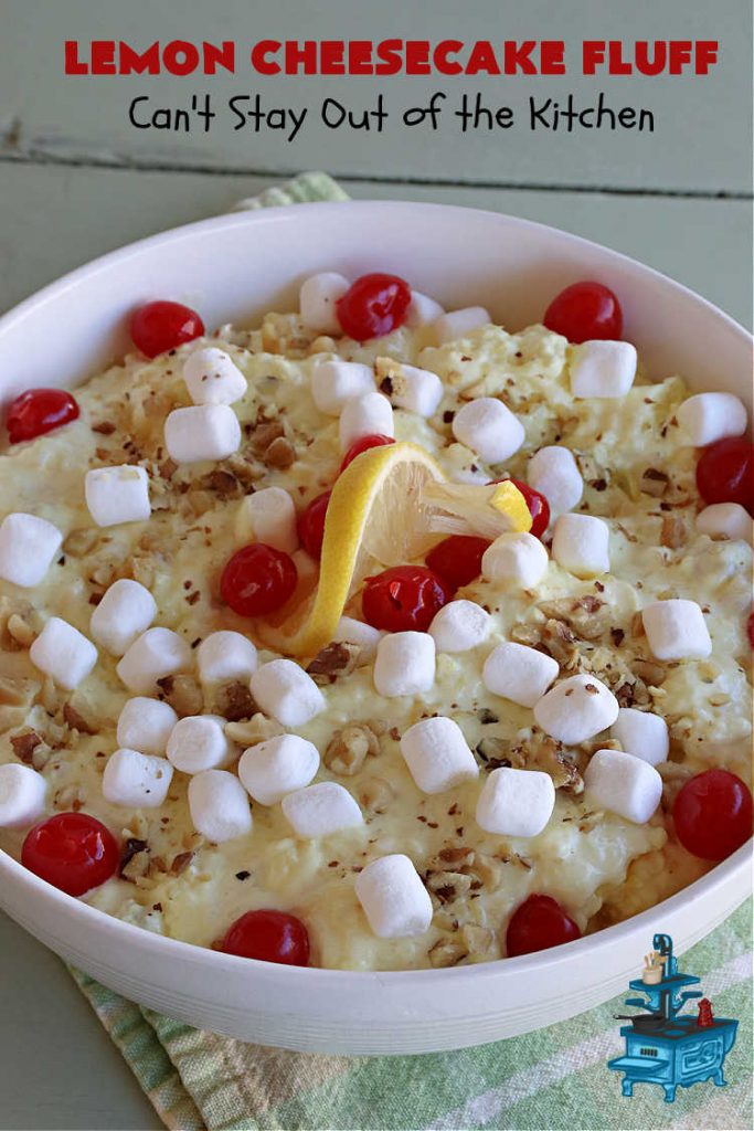 Lemon Cheesecake Fluff | Can't Stay Out of the Kitchen | this spectacular "fluff"-type #FruitSalad is terrific for company or #holiday dinners. It includes #CreamCheese, #CheesecakePuddingMix, #Lemon #JellO, miniature #marshmallows, #CoolWhip & #walnuts.Serve it in a trifle dish, glass bowl or parfait glasses for special occasions. #LemonCheesecakeFluff #salad