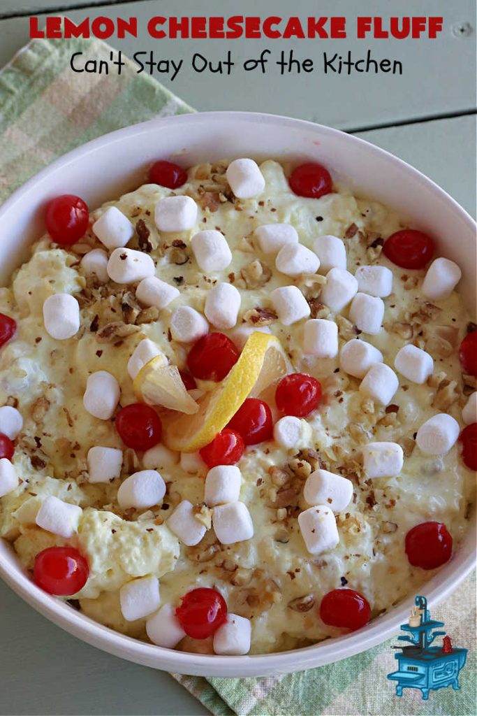 Lemon Cheesecake Fluff | Can't Stay Out of the Kitchen | this spectacular "fluff"-type #FruitSalad is terrific for company or #holiday dinners. It includes #CreamCheese, #CheesecakePuddingMix, #Lemon #JellO, miniature #marshmallows, #CoolWhip & #walnuts.Serve it in a trifle dish, glass bowl or parfait glasses for special occasions. #LemonCheesecakeFluff #salad
