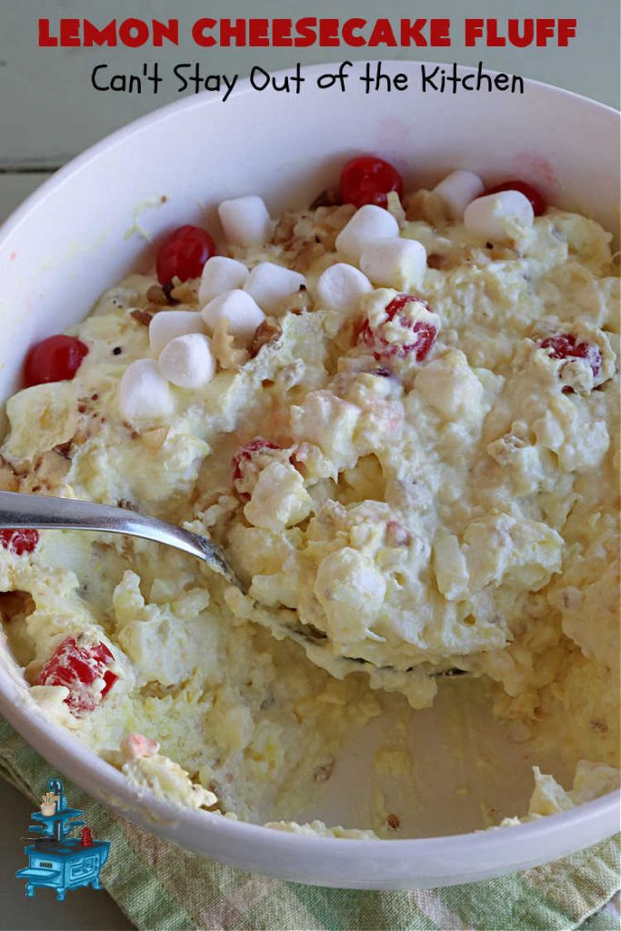 Lemon Cheesecake Fluff | Can't Stay Out of the Kitchen | this spectacular "fluff"-type #FruitSalad is terrific for company or #holiday dinners. It includes #CreamCheese, #CheesecakePuddingMix, #Lemon #JellO, miniature #marshmallows, #CoolWhip & #walnuts.Serve it in a trifle dish, glass bowl or parfait glasses for special occasions. #LemonCheesecakeFluff #salad