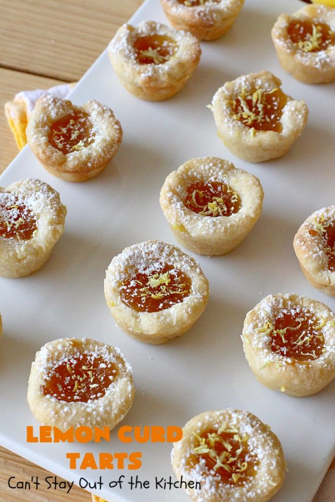 Lemon Curd Tarts | Can't Stay Out of the Kitchen | This awesome 6 ingredient #recipe is perfect for #holiday #baking & #ChristmasCookieExchanges. These festive #cookies are filled with #LemonCurd & are absolutely delightful. Every bite will have you drooling! #lemons #dessert #LemonDessert #LemonCurdTarts