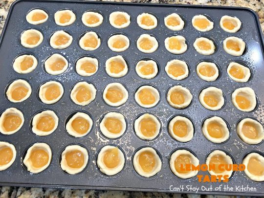Lemon Curd Tarts | Can't Stay Out of the Kitchen | This awesome 6 ingredient #recipe is perfect for #holiday #baking & #ChristmasCookieExchanges. These festive #cookies are filled with #LemonCurd & are absolutely delightful. Every bite will have you drooling! #lemons #dessert #LemonDessert #LemonCurdTarts