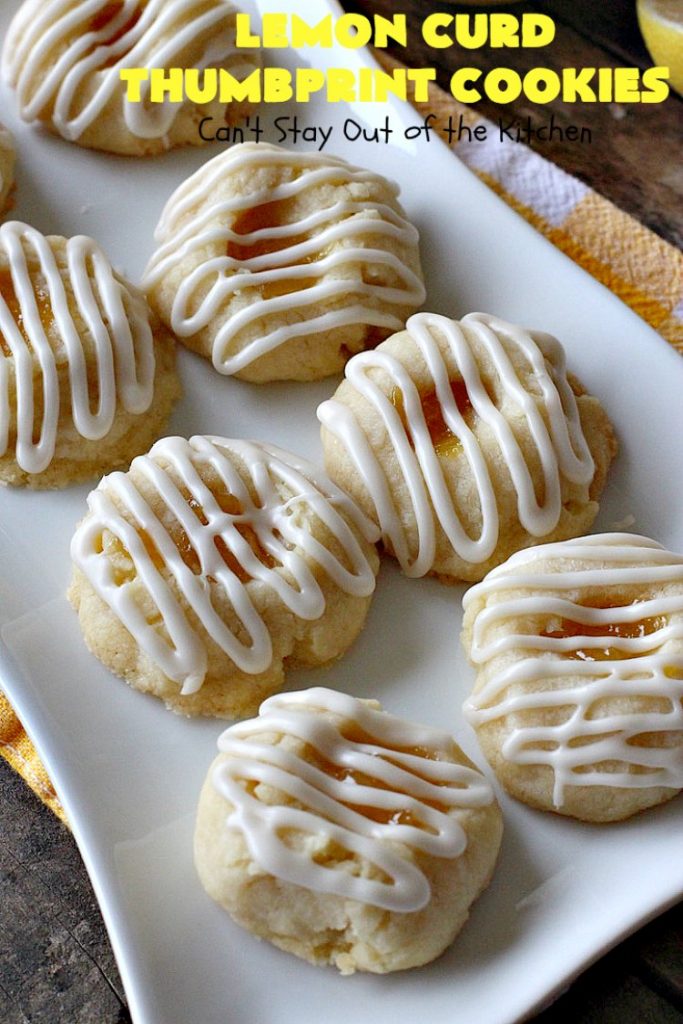 Lemon Curd Thumbprint Cookies | Can't Stay Out of the Kitchen | these delectable #thumbprintcookies are terrific for the #holidays & #Christmas #baking. #LemonCurd gives them a little bite & the vanilla icing on top makes them sweetly heavenly. #cookies #dessert #lemon #LemonDessert #HolidayDessert #ChristmasDessert #ChristmasCookieExchange #ChristmasCookie
