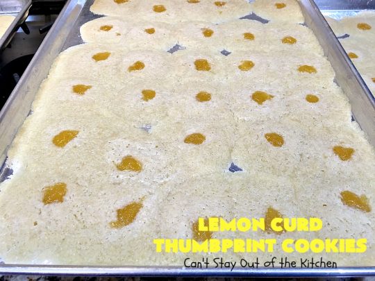Lemon Curd Thumbprint Cookies | Can't Stay Out of the Kitchen | these delectable #thumbprintcookies are terrific for the #holidays & #Christmas #baking. #LemonCurd gives them a little bite & the vanilla icing on top makes them sweetly heavenly. #cookies #dessert #lemon #LemonDessert #HolidayDessert #ChristmasDessert #ChristmasCookieExchange #ChristmasCookie