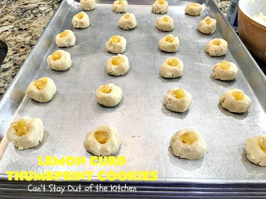 Lemon Curd Thumbprint Cookies | Can't Stay Out of the Kitchen | these delectable #thumbprintcookies are terrific for the #holidays & #Christmas #baking. #LemonCurd gives them a little bite & the vanilla icing on top makes them sweetly heavenly. #cookies #dessert #lemon #LemonDessert #HolidayDessert #ChristmasDessert #ChristmasCookieExchange #ChristmasCookie