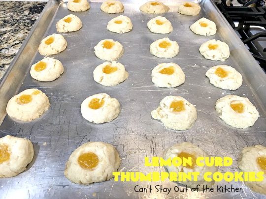Lemon Curd Thumbprint Cookies | Can't Stay Out of the Kitchen | these delectable #thumbprintcookies are terrific for the #holidays & #Christmas #baking. #LemonCurd gives them a little bite & the vanilla icing on top makes them sweetly heavenly. #cookies #dessert #lemon #LemonDessert #HolidayDessert #ChristmasDessert #ChristmasCookieExchange #ChristmasCookie