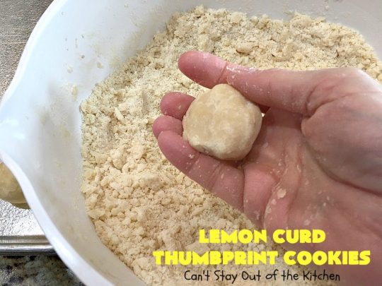 Lemon Curd Thumbprint Cookies | Can't Stay Out of the Kitchen | these delectable #thumbprintcookies are terrific for the #holidays & #Christmas #baking. #LemonCurd gives them a little bite & the vanilla icing on top makes them sweetly heavenly. #cookies #dessert #lemon #LemonDessert #HolidayDessert #ChristmasDessert #ChristmasCookieExchange #ChristmasCookie