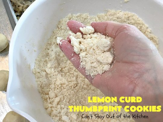 Lemon Curd Thumbprint Cookies | Can't Stay Out of the Kitchen | these delectable #thumbprintcookies are terrific for the #holidays & #Christmas #baking. #LemonCurd gives them a little bite & the vanilla icing on top makes them sweetly heavenly. #cookies #dessert #lemon #LemonDessert #HolidayDessert #ChristmasDessert #ChristmasCookieExchange #ChristmasCookie