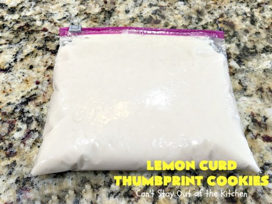 Lemon Curd Thumbprint Cookies | Can't Stay Out of the Kitchen | these delectable #thumbprintcookies are terrific for the #holidays & #Christmas #baking. #LemonCurd gives them a little bite & the vanilla icing on top makes them sweetly heavenly. #cookies #dessert #lemon #LemonDessert #HolidayDessert #ChristmasDessert #ChristmasCookieExchange #ChristmasCookie