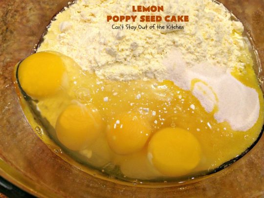 Lemon Poppy Seed Cake | Can't Stay Out of the Kitchen | this delicious #coffeecake starts with a boxed #cakemix. It's easy, lemony & absolutely mouthwatering. We serve it for #breakfast or as a #dessert. #Holiday #Lemon #poppyseeds #LemonCake #HolidayBreakfast #HolidayDessert #EasyLemonCake #LemonDessert #LemonCoffeeCake
