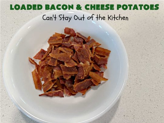 Loaded Bacon and Cheese Potatoes | Can't Stay Out of the Kitchen | These fantastic #potatoes are dripping with #CheddarCheese & loads of #bacon. Every bite will knock your socks off. This is a great #casserole for family, company or #holiday dinners. Everyone will want seconds. #GlutenFree #pork #LoadedBaconAndCheesePotatoes