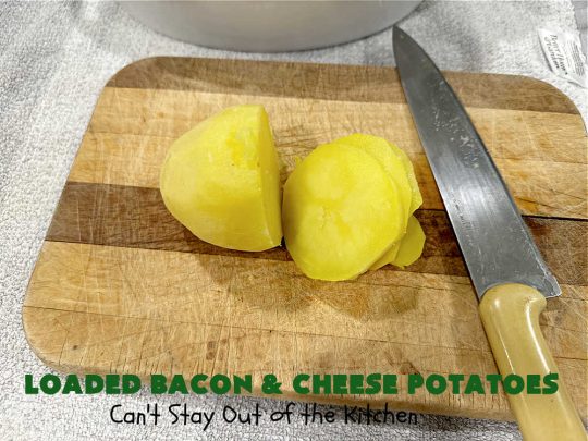Loaded Bacon and Cheese Potatoes | Can't Stay Out of the Kitchen | These fantastic #potatoes are dripping with #CheddarCheese & loads of #bacon. Every bite will knock your socks off. This is a great #casserole for family, company or #holiday dinners. Everyone will want seconds. #GlutenFree #pork #LoadedBaconAndCheesePotatoes