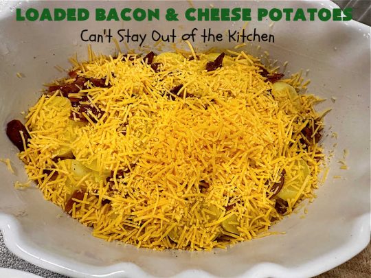 Loaded Bacon and Cheese Potatoes | Can't Stay Out of the Kitchen | These fantastic #potatoes are dripping with #CheddarCheese & loads of #bacon. Every bite will knock your socks off. This is a great #casserole for family, company or #holiday dinners. Everyone will want seconds. #GlutenFree #pork #LoadedBaconAndCheesePotatoes