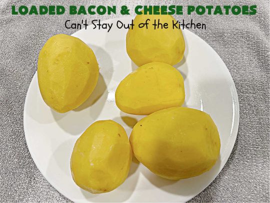 Loaded Bacon and Cheese Potatoes | Can't Stay Out of the Kitchen | These fantastic #potatoes are dripping with #CheddarCheese & loads of #bacon. Every bite will knock your socks off. This is a great #casserole for family, company or #holiday dinners. Everyone will want seconds. #GlutenFree #pork #LoadedBaconAndCheesePotatoes