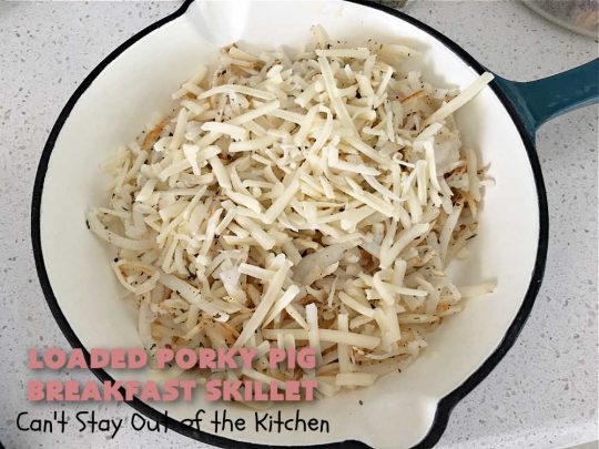 Loaded Porky Pig Breakfast Skillet | Can't Stay Out of the Kitchen | this fantastic #BreakfastSkillet includes #ham, #sausage & #bacon along with lots of fresh veggies, two kinds of #cheese, #HashBrowns & #eggs. It's irresistible & mouthwatering along with being a very filling and satisfying #breakfast entree for weekends or #holidays. If you enjoy big breakfasts, this one can't be beat! #LoadedPorkyPigBreakfastSkillet #pork #SkilletBreakfast #MontereyJackCheese #CheddarCheese