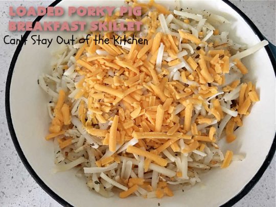 Loaded Porky Pig Breakfast Skillet | Can't Stay Out of the Kitchen | this fantastic #BreakfastSkillet includes #ham, #sausage & #bacon along with lots of fresh veggies, two kinds of #cheese, #HashBrowns & #eggs. It's irresistible & mouthwatering along with being a very filling and satisfying #breakfast entree for weekends or #holidays. If you enjoy big breakfasts, this one can't be beat! #LoadedPorkyPigBreakfastSkillet #pork #SkilletBreakfast #MontereyJackCheese #CheddarCheese