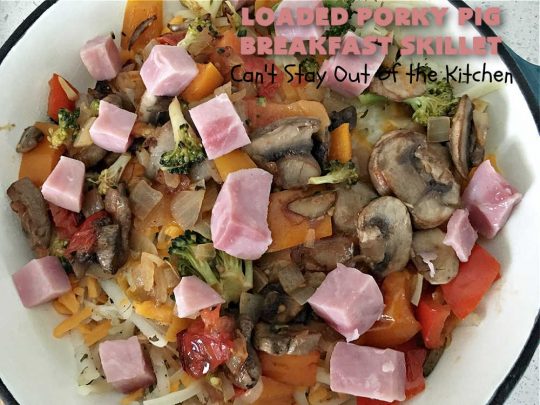 Loaded Porky Pig Breakfast Skillet | Can't Stay Out of the Kitchen | this fantastic #BreakfastSkillet includes #ham, #sausage & #bacon along with lots of fresh veggies, two kinds of #cheese, #HashBrowns & #eggs. It's irresistible & mouthwatering along with being a very filling and satisfying #breakfast entree for weekends or #holidays. If you enjoy big breakfasts, this one can't be beat! #LoadedPorkyPigBreakfastSkillet #pork #SkilletBreakfast #MontereyJackCheese #CheddarCheese