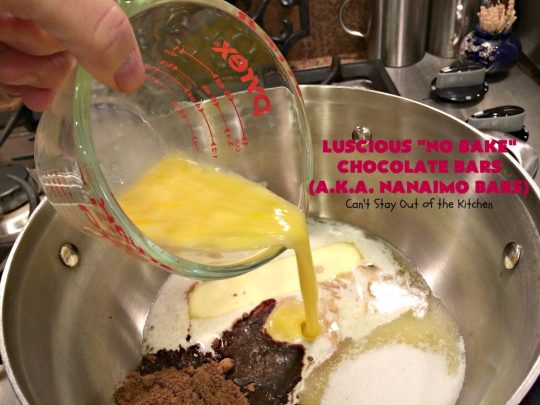 Luscious No Bake Chocolate Bars - Nanaimo Bars | Can't Stay Out of the Kitchen | this #dessert is sinfully rich & so decadent. Every bite will have you drooling. It's the perfect #brownie to wow your family & friends. #FathersDay #FathersDayDessert #Chocolate #cookie #ChocolateDessert #NanaimoBars #Canada #coconut #NoBakeDessert #LusciousNoBakeChocolateBars #holiday #HolidayDessert
