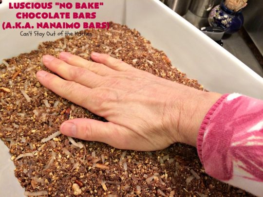 Luscious No Bake Chocolate Bars - Nanaimo Bars | Can't Stay Out of the Kitchen | this #dessert is sinfully rich & so decadent. Every bite will have you drooling. It's the perfect #brownie to wow your family & friends. #FathersDay #FathersDayDessert #Chocolate #cookie #ChocolateDessert #NanaimoBars #Canada #coconut #NoBakeDessert #LusciousNoBakeChocolateBars #holiday #HolidayDessert