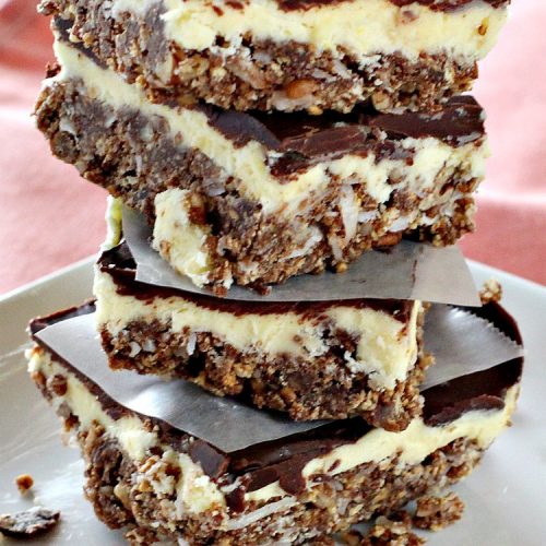 Luscious No Bake Chocolate Bars - Nanaimo Bars | Can't Stay Out of the Kitchen | this #dessert is sinfully rich & so decadent. Every bite will have you drooling. It's the perfect #brownie to wow your family & friends. #FathersDay #FathersDayDessert #Chocolate #cookie #ChocolateDessert #NanaimoBars #Canada #coconut #NoBakeDessert #LusciousNoBakeChocolateBars #holiday #HolidayDessert