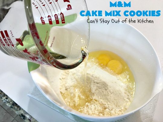M&M Cake Mix Cookies | Can't Stay Out of the Kitchen | These delectable 5-ingredient #cookies are so quick & easy to make. They're filled with #MMs & start with a #CakeMix. Perfect for #ValentinesDay, #tailgating parties, potlucks or any gathering with friends. #MMDessert #HolidayDessert #ValentinesDayDessert #ChocolateDessert #CakeMixDessert #MMCakeMixCookies #chocolate #dessert