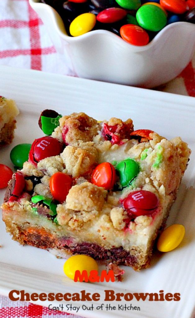 M&M Cheesecake Brownies | Can't Stay Out of the Kitchen | this fantastic #brownie is to die for! A luscious #cheesecake layer is sandwiched between 2 layers of M&M #cookiedough and topped with more #M&Ms. Absolutely divine! #dessert