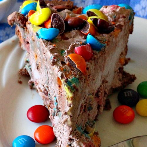 M&M Chocolate Pie | Can't Stay Out of the Kitchen | this awesome 5-ingredient #dessert is rich, decadent & heavenly. The #chocolate filling is filled with #M&Ms making it utterly delightful. Perfect for #holiday or company parties. #pie #ChocolateDessert #HolidayDessert #M&MDessert #M&MChocolatePie #ChocolatePie #MMs