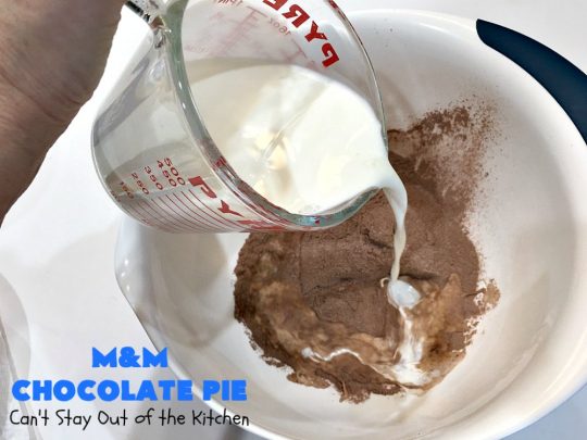 M&M Chocolate Pie | Can't Stay Out of the Kitchen | this awesome 5-ingredient #dessert is rich, decadent & heavenly. The #chocolate filling is filled with #M&Ms making it utterly delightful. Perfect for #holiday or company parties. #pie #ChocolateDessert #HolidayDessert #M&MDessert #M&MChocolatePie #ChocolatePie #MMs