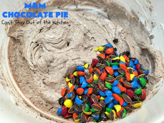 M&M Chocolate Pie | Can't Stay Out of the Kitchen | this awesome 5-ingredient #dessert is rich, decadent & heavenly. The #chocolate filling is filled with #M&Ms making it utterly delightful. Perfect for #holiday or company parties. #pie #ChocolateDessert #HolidayDessert #M&MDessert #M&MChocolatePie #ChocolatePie #MMs