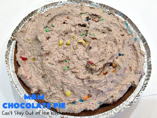 M&M Chocolate Pie | Can't Stay Out of the Kitchen | this awesome 5-ingredient #dessert is rich, decadent & heavenly. The #chocolate filling is filled with #M&Ms making it utterly delightful. Perfect for #holiday or company parties. #pie #ChocolateDessert #HolidayDessert #M&MDessert #M&MChocolatePie #ChocolatePie #MMs